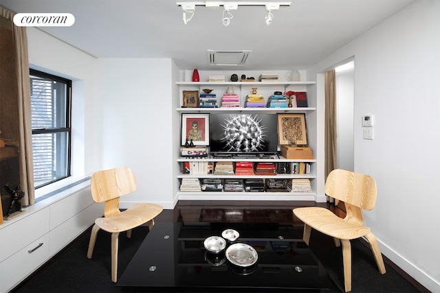 240 E 24th St Unit 4B, New York City, NY 10010 - living area featuring baseboards