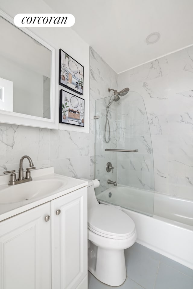 46-12 161st St Unit 3B, New York City, NY 11358 - bathroom with vanity,  shower combination, toilet, and tile walls