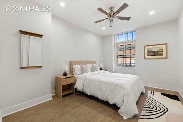 1604 Lexington Ave, New York City, NY 10029 - bedroom with wood finished floors, baseboards, recessed lighting, and ceiling fan