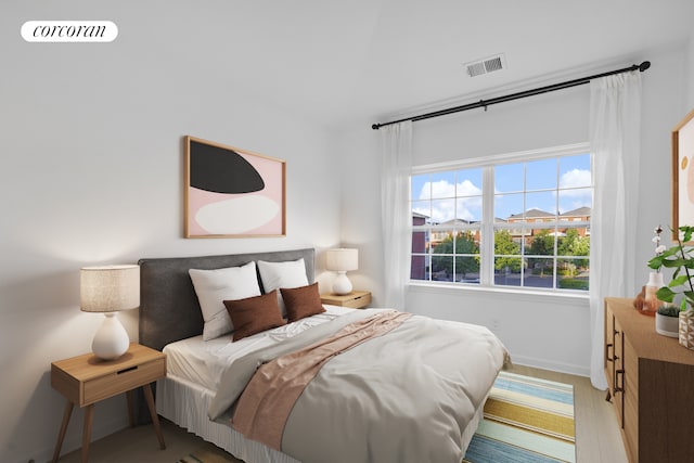 3-17 Endeavor Pl Unit C, New York City, NY 11356 - bedroom featuring baseboards and light wood-style floors