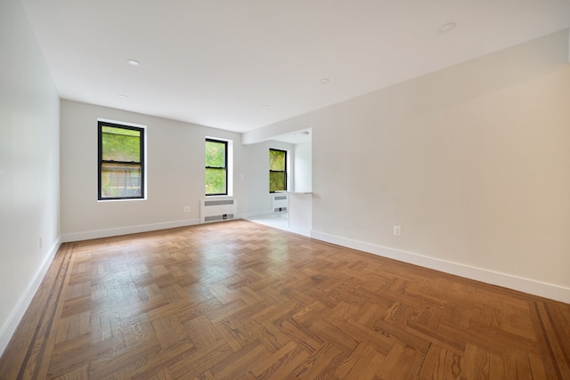 41-12 41st St Unit 2N, New York City, NY 11104 - unfurnished room featuring radiator and baseboards