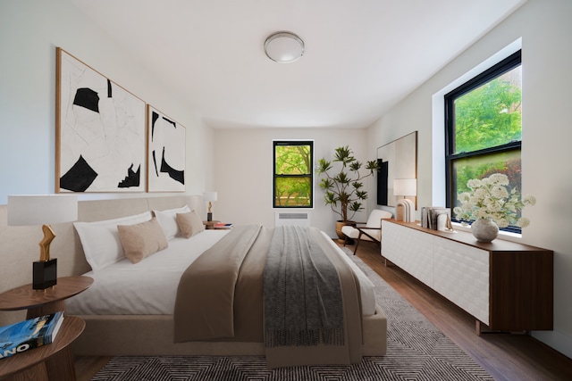 41-12 41st St Unit 2N, New York City, NY 11104 - bedroom featuring dark wood-style flooring