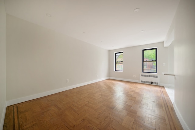 41-12 41st St Unit 2N, New York City, NY 11104 - spare room with radiator and baseboards