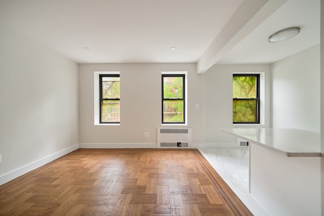 41-12 41st St Unit 2N, New York City, NY 11104 - unfurnished room featuring radiator and baseboards