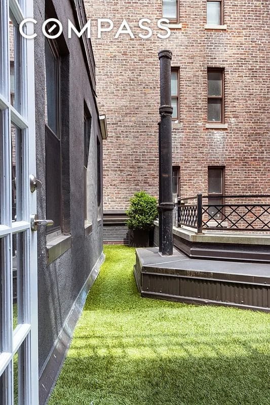 140 W 58th St Pha, Pha, New York City, NY 10019 - view of green lawn