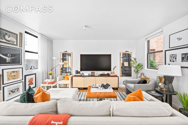 140 W 58th St Pha, Pha, New York City, NY 10019 - living area with wood finished floors and baseboards