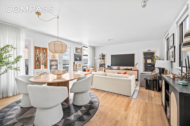 140 W 58th St Pha, Pha, New York City, NY 10019 - dining room with light wood finished floors