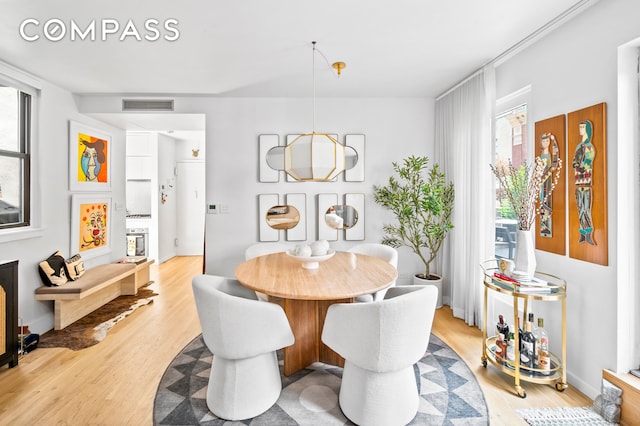 140 W 58th St Pha, Pha, New York City, NY 10019 - dining space with light wood finished floors