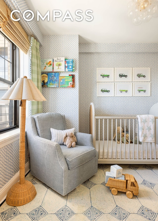 200 E 16th St Unit 14C, New York City, NY 10003 - bedroom featuring wallpapered walls