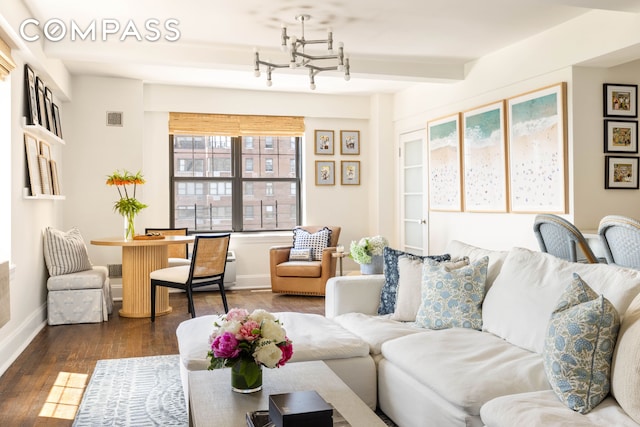 200 E 16th St Unit 14C, New York City, NY 10003 - living area with dark wood-type flooring, baseboards, and a chandelier