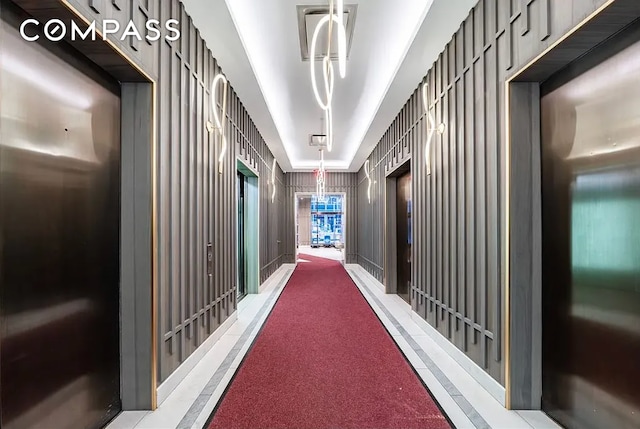 75 Wall St Unit 27F, New York City, NY 10005 - hall featuring elevator and light colored carpet