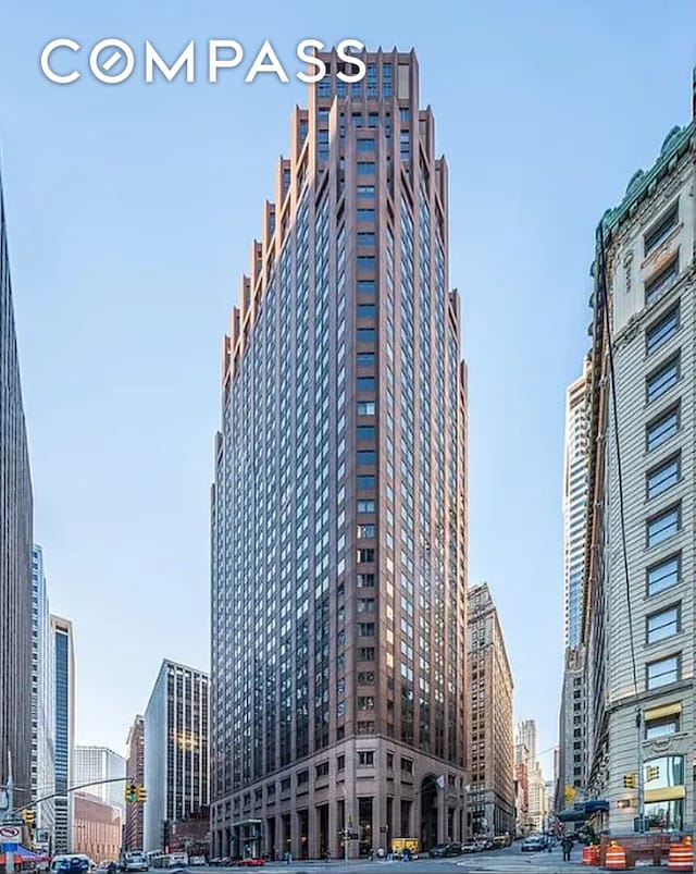 75 Wall St Unit 27F, New York City, NY 10005 - view of building exterior featuring a city view