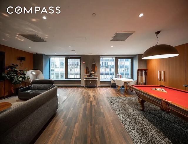 75 Wall St Unit 27F, New York City, NY 10005 - recreation room with billiards, wood finished floors, healthy amount of natural light, recessed lighting, and wood walls