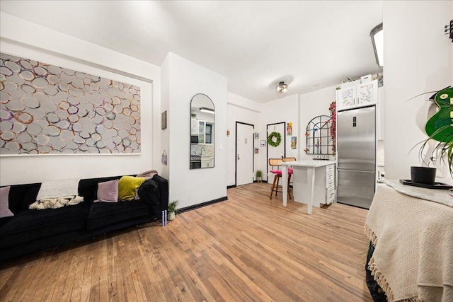 157 W 123rd St Unit 4C, New York City, NY 10027 - living room with light wood-style floors