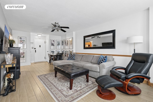 520 E 81st St Unit 8A, New York City, NY 10028 - living room featuring wood finished floors and ceiling fan