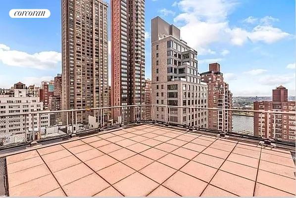 520 E 81st St Unit 8A, New York City, NY 10028 - view of patio / terrace featuring a skyline view