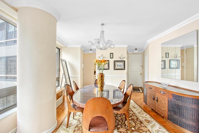 167 E 61st St Unit 11B, New York City, NY 10065 - dining room featuring a chandelier, crown molding, and baseboards