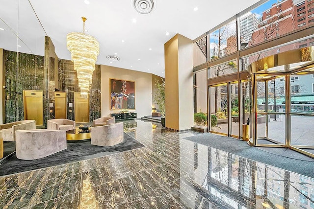 167 E 61st St Unit 11B, New York City, NY 10065 - community lobby featuring a high ceiling and recessed lighting