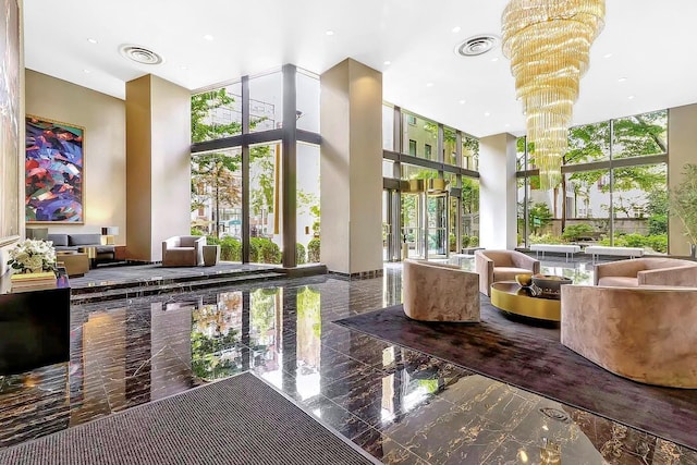 167 E 61st St Unit 11B, New York City, NY 10065 - lobby with a towering ceiling and recessed lighting