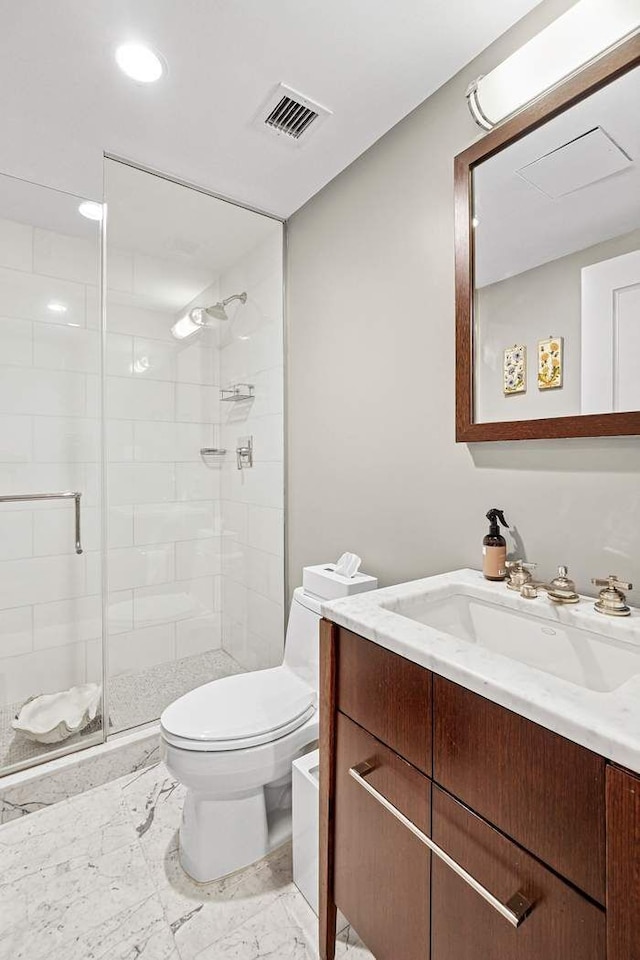 140 E 63rd St Unit 11C, New York City, NY 10065 - bathroom with vanity, toilet, a shower stall, marble look tile flooring, and recessed lighting