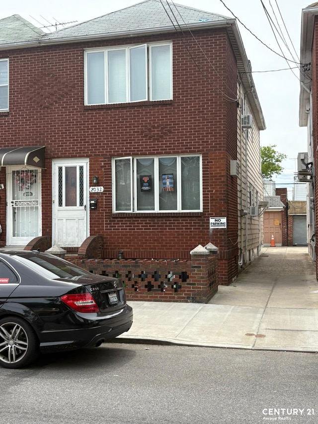 2032 W 4th St, New York City, NY 11223 - multi unit property featuring brick siding and roof with shingles