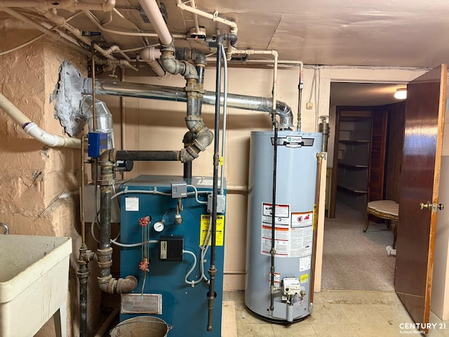 2032 W 4th St, New York City, NY 11223 - utility room with gas water heater and a heating unit
