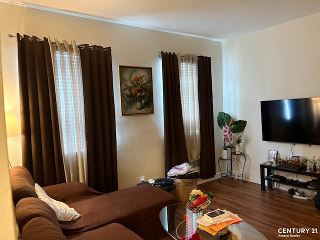 2032 W 4th St, New York City, NY 11223 - living area featuring wood finished floors and baseboards