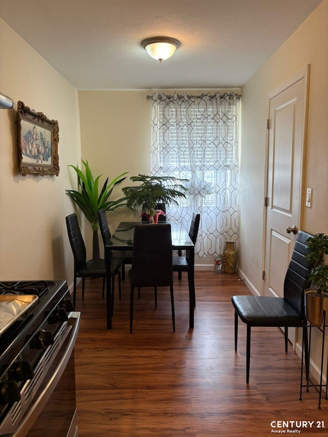 2032 W 4th St, New York City, NY 11223 - dining room with wood finished floors and baseboards