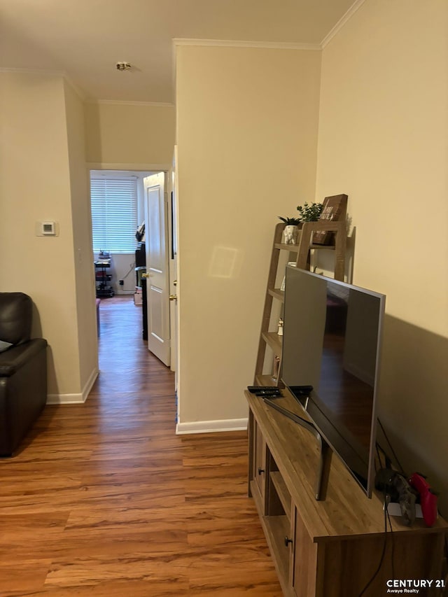 2032 W 4th St, New York City, NY 11223 - hall with ornamental molding, wood finished floors, and baseboards