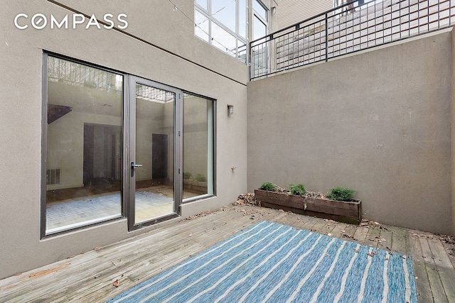 328 Central Ave Unit 1B, New York City, NY 11221 - view of patio with a wooden deck