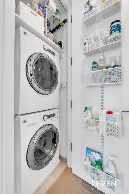 30 Riverside Blvd Unit 22F, New York City, NY 10069 - laundry area with stacked washer and clothes dryer