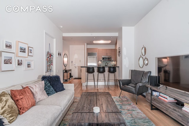 325 5th Ave Unit 14E, New York City, NY 10016 - living area featuring light wood-style floors