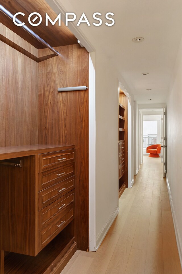 16 Warren St Unit 5, New York City, NY 10007 - hallway with light wood-type flooring and baseboards