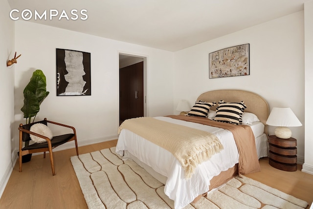 16 Warren St Unit 5, New York City, NY 10007 - bedroom with wood finished floors and baseboards