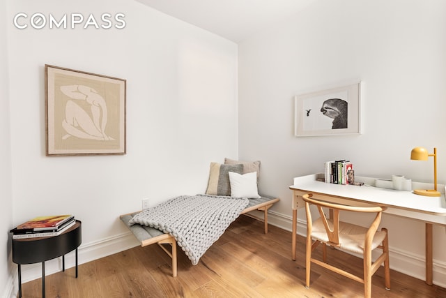 744 Park Pl Unit 1A, New York City, NY 11216 - home office with wood finished floors and baseboards