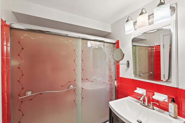 111 Hicks St Unit 5-Qr, New York City, NY 11201 - full bath with tile walls, vanity, a shower, and a wainscoted wall