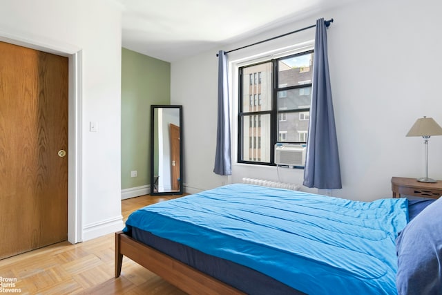 109 Seaman Ave Unit 4A, New York City, NY 10034 - bedroom featuring cooling unit and baseboards