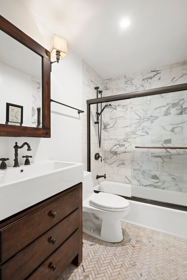 366 W 11th St Unit 6Ef, New York City, NY 10014 - bathroom featuring vanity, toilet, and shower / tub combination