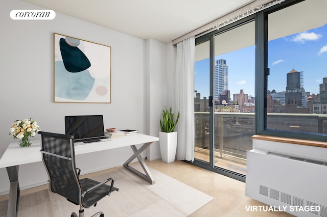 127 E 30th St Unit 11B, New York City, NY 10016 - home office featuring radiator heating unit