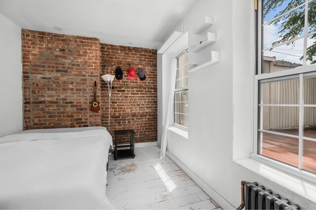 638 Monroe St, New York City, NY 11221 - covered porch featuring radiator heating unit
