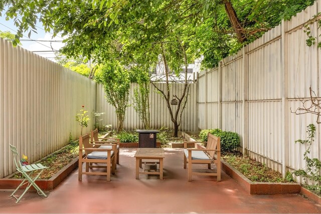 638 Monroe St, New York City, NY 11221 - fenced backyard featuring a patio area