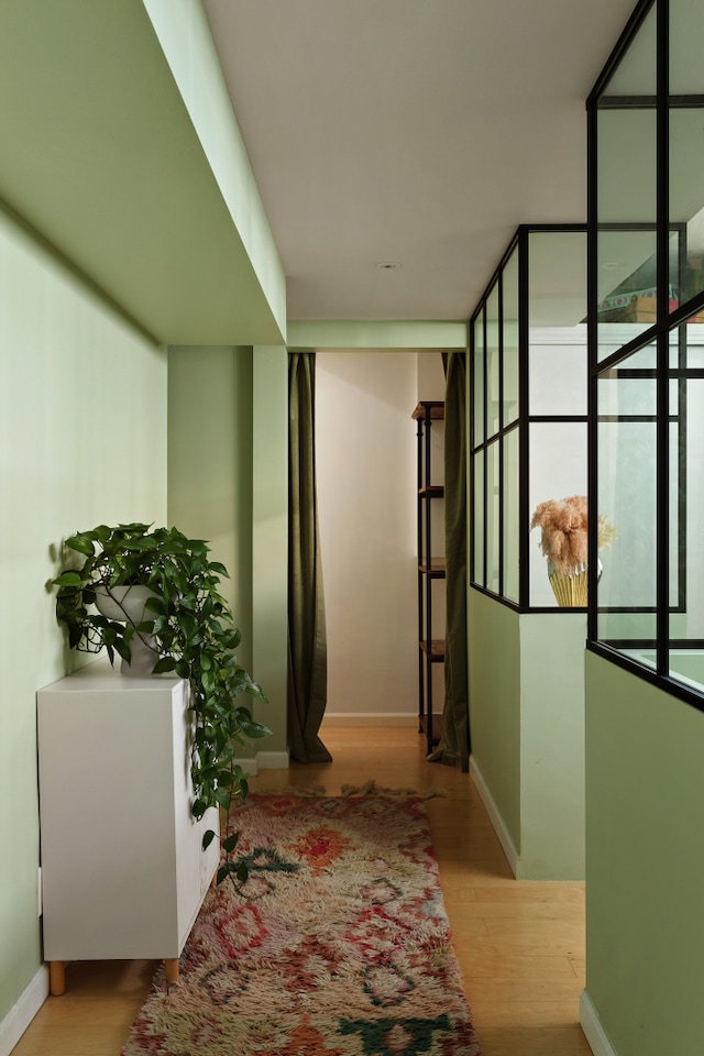 136 Powers St Unit 1G, New York City, NY 11211 - hall featuring wood finished floors and baseboards