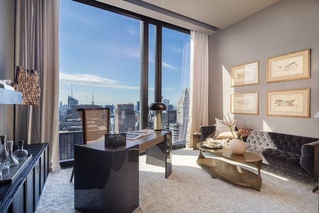 111 W 57th St Unit 57, New York City, NY 10019 - carpeted home office with plenty of natural light and a city view