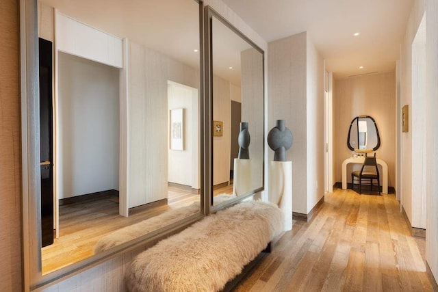 111 W 57th St Unit 57, New York City, NY 10019 - hallway with light wood-style flooring