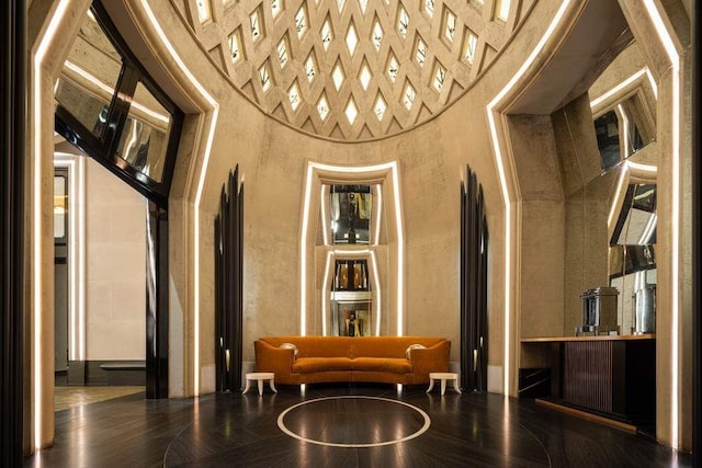 111 W 57th St Unit 57, New York City, NY 10019 - community lobby with a high ceiling and a textured wall