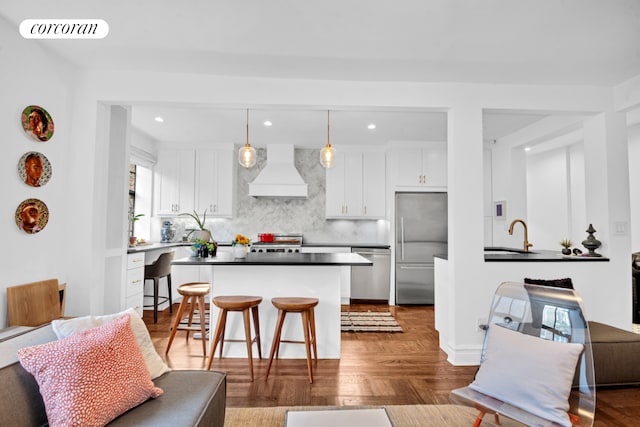 116 Pinehurst Ave Unit H23, New York City, NY 10033 - living room with recessed lighting and dark wood finished floors