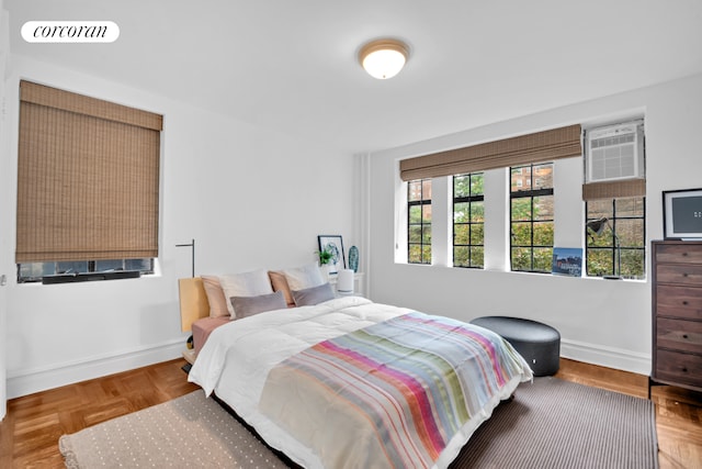 116 Pinehurst Ave Unit H23, New York City, NY 10033 - bedroom with baseboards and a wall unit AC