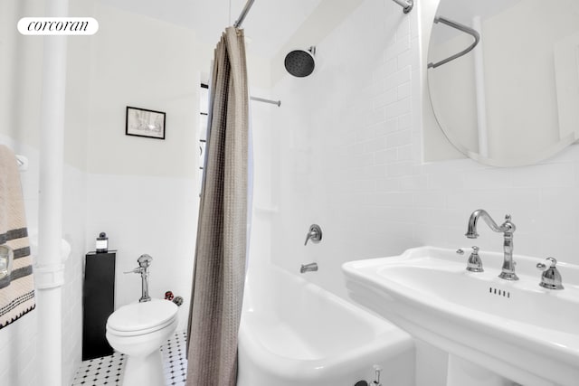 116 Pinehurst Ave Unit H23, New York City, NY 10033 - bathroom featuring tile walls and shower / bathtub combination with curtain