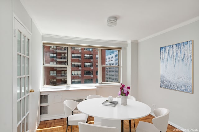 233 E 70th St Unit 8T, New York City, NY 10021 - dining space featuring crown molding