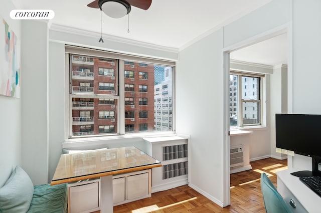 233 E 70th St Unit 8T, New York City, NY 10021 - sitting room featuring crown molding, ceiling fan, and baseboards